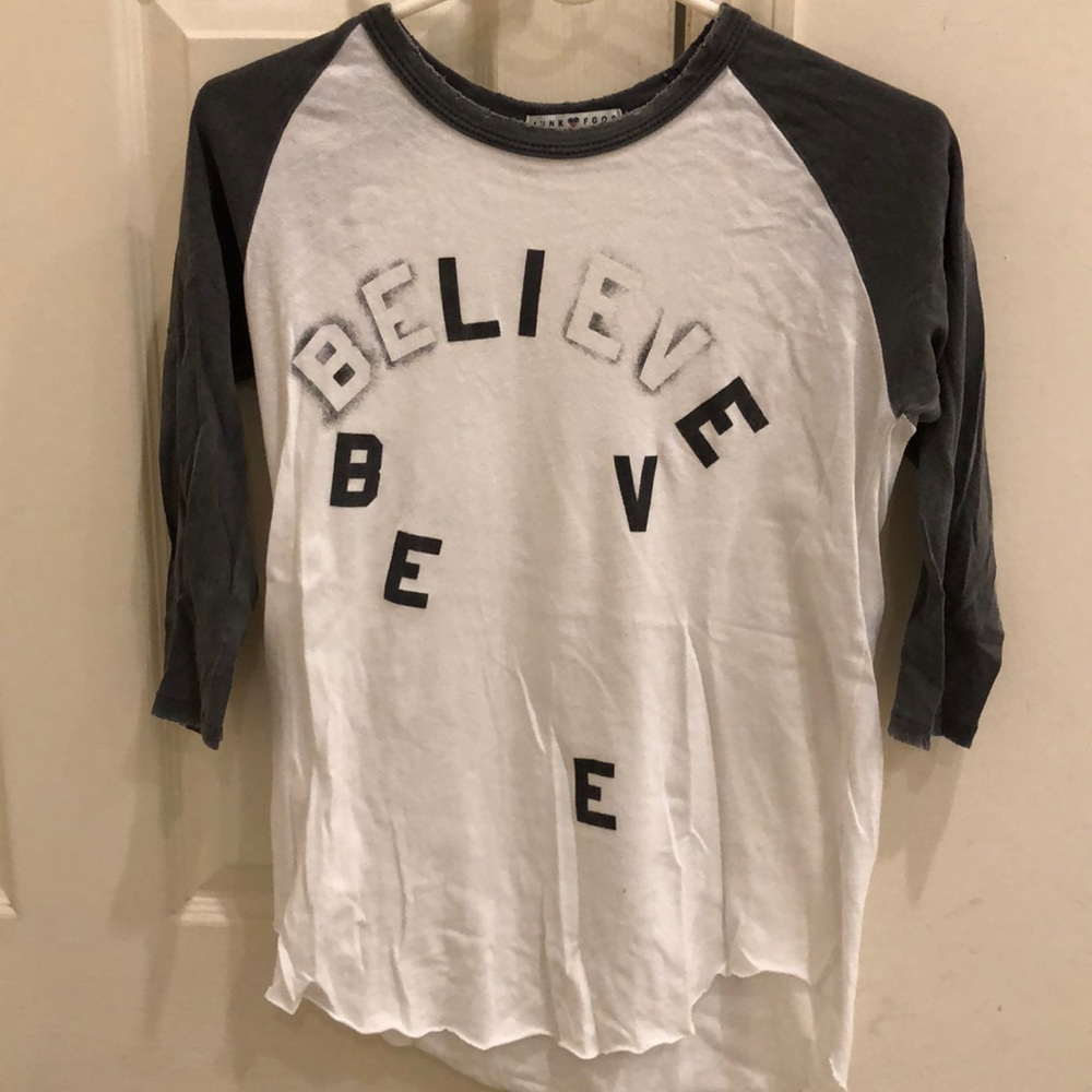Junk Food 3/4 sleeve shirt size small. Says believe